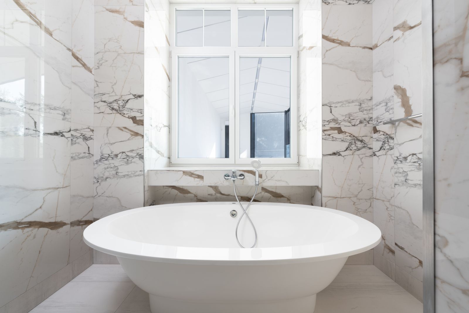 Marble bathroom with freestanding tub — luxury Arizona primary bath remodel